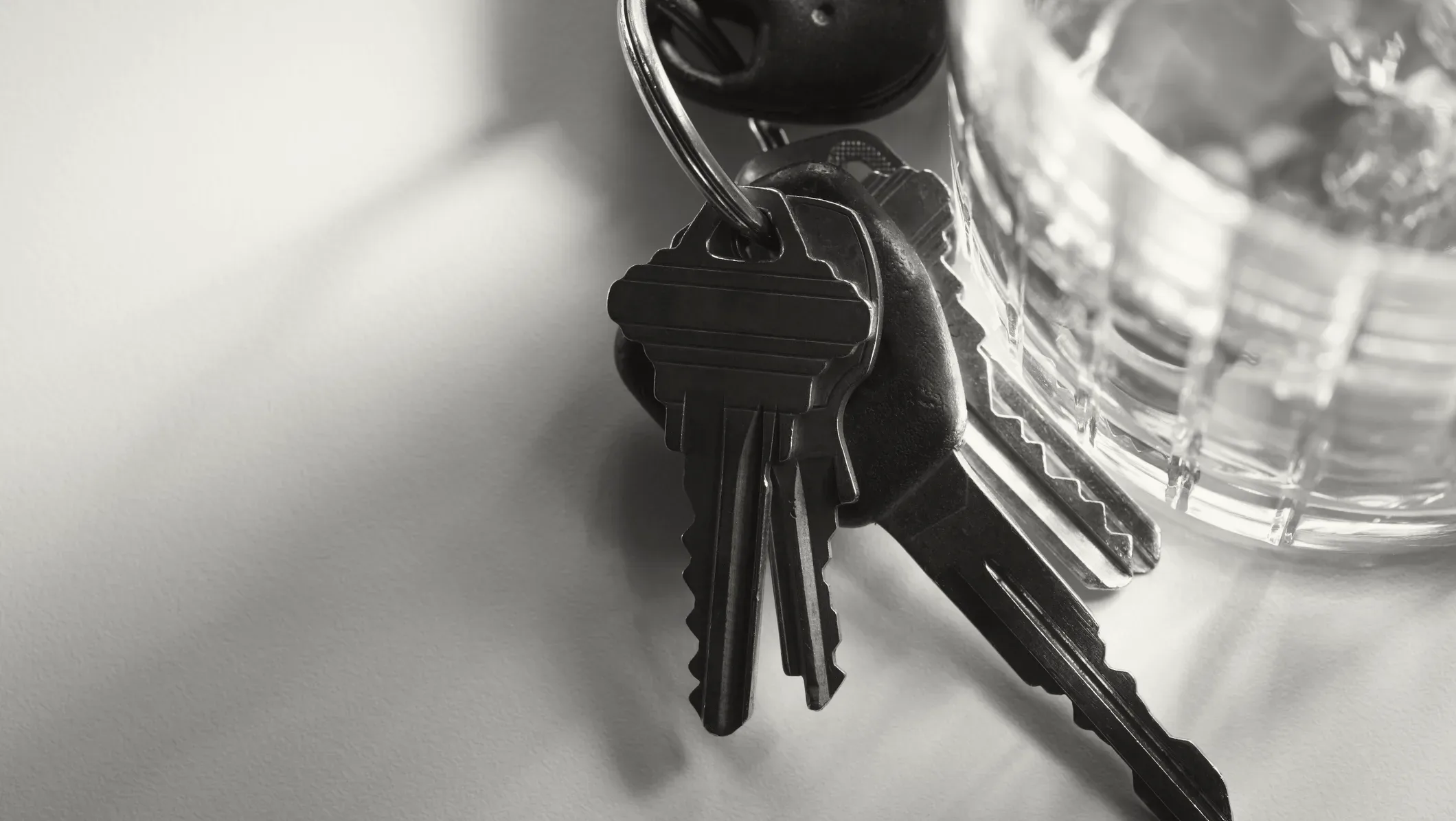 alcohol glass and car keys